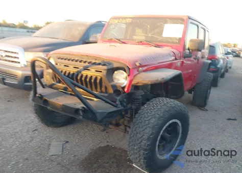 2010 Jeep Wrangler Unlimited Rubicon from USA, damaged, VIN 1J4BA6H11AL128604